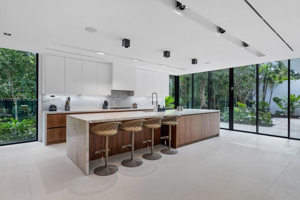 Contemporary Coconut Grove Estate with Guest House, Gym, Theater, and Resort-Style Pool for $24.9 Million