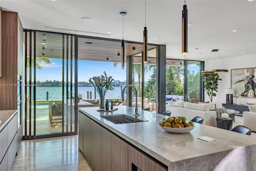 Luxurious $9.5 Million Waterfront Estate with Bay Views, Pool, and Ocean Access in Miami Beach