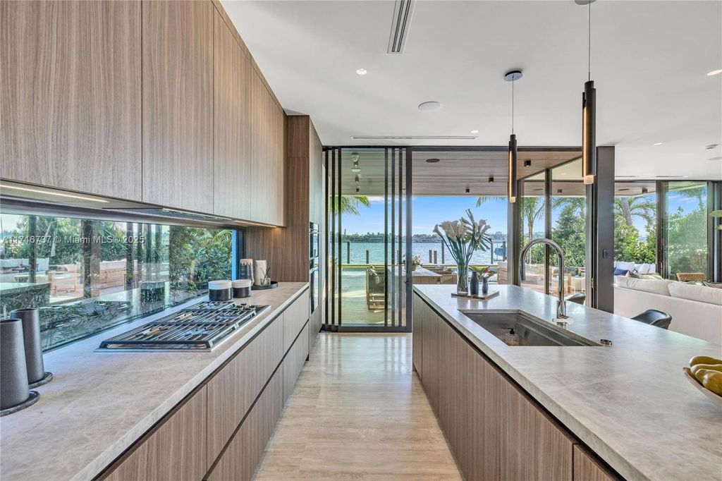 Luxurious $9.5 Million Waterfront Estate with Bay Views, Pool, and Ocean Access in Miami Beach