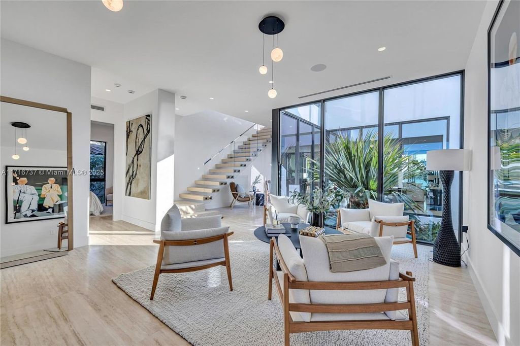 Luxurious $9.5 Million Waterfront Estate with Bay Views, Pool, and Ocean Access in Miami Beach