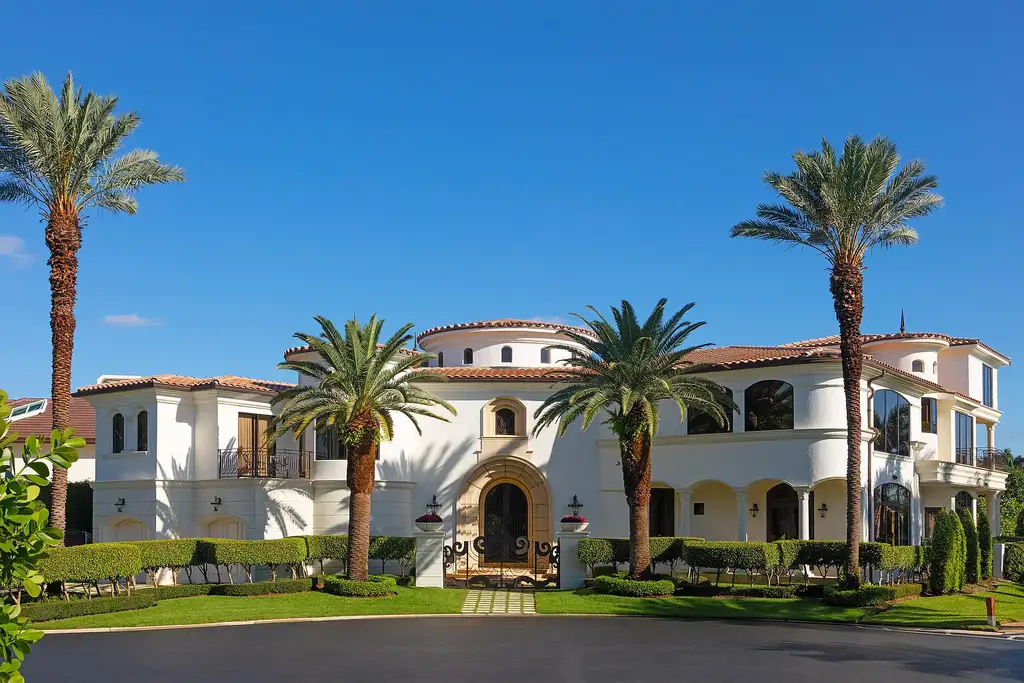 775 Oriole Circle, a $9.95M luxurious waterfront estate in Boca Raton, featuring an infinity pool, private dock, and breathtaking Intracoastal views in The Sanctuary.