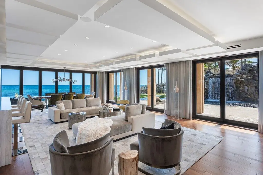 Expansive Balinese-inspired mansion at 1370 S Ocean Boulevard, Manalapan, offering world-class resort-style living and direct Intracoastal access.