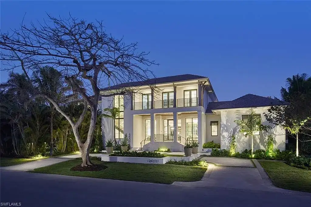 Spacious and elegantly designed living room at 2021 E Gordon Dr, Naples, with high ceilings, luxury finishes, and seamless indoor-outdoor living.