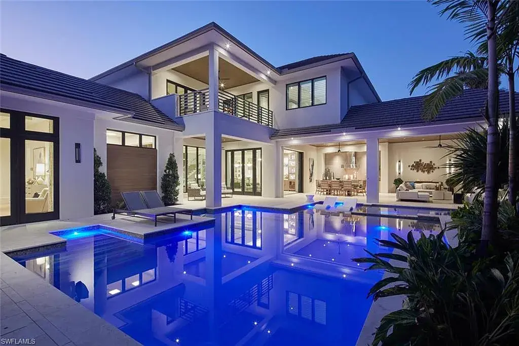 Spacious and elegantly designed living room at 2021 E Gordon Dr, Naples, with high ceilings, luxury finishes, and seamless indoor-outdoor living.