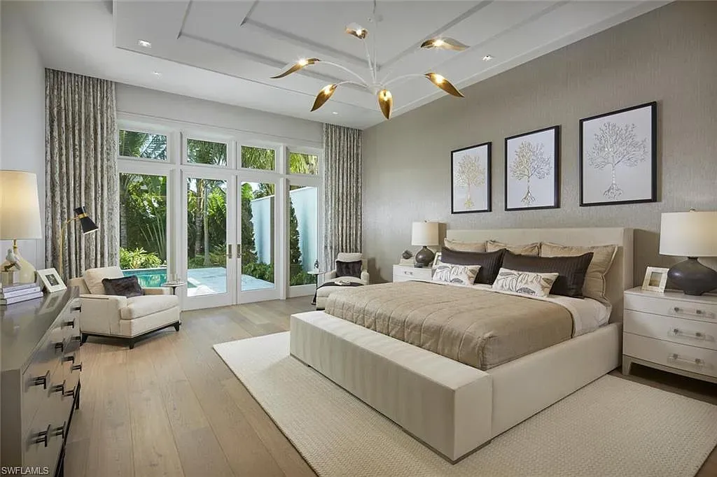 Spacious and elegantly designed living room at 2021 E Gordon Dr, Naples, with high ceilings, luxury finishes, and seamless indoor-outdoor living.