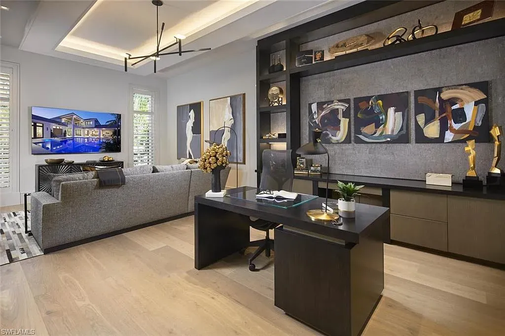 Spacious and elegantly designed living room at 2021 E Gordon Dr, Naples, with high ceilings, luxury finishes, and seamless indoor-outdoor living.