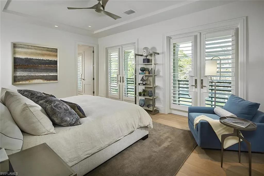 Spacious and elegantly designed living room at 2021 E Gordon Dr, Naples, with high ceilings, luxury finishes, and seamless indoor-outdoor living.