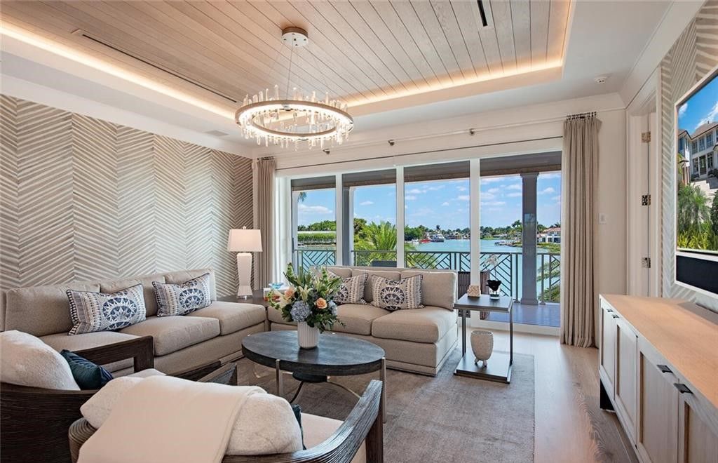 This exquisite 2022-built home offers breathtaking Doubloon Bay views and exclusive Cutlass Cove beach access.