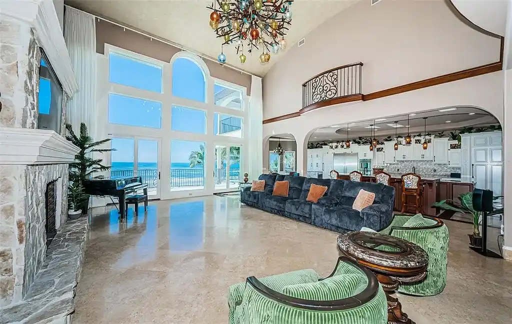 Built in 2014, this single-family residence stands on a 0.37-acre lot with 80 feet of pristine white sand beach frontage. The home’s architectural brilliance combines Tuscan coastal elements with modern craftsmanship, ensuring every detail is both aesthetically pleasing and functionally superior. With $1,532 per square foot, this estate is a testament to luxury living in Redington Beach real estate.