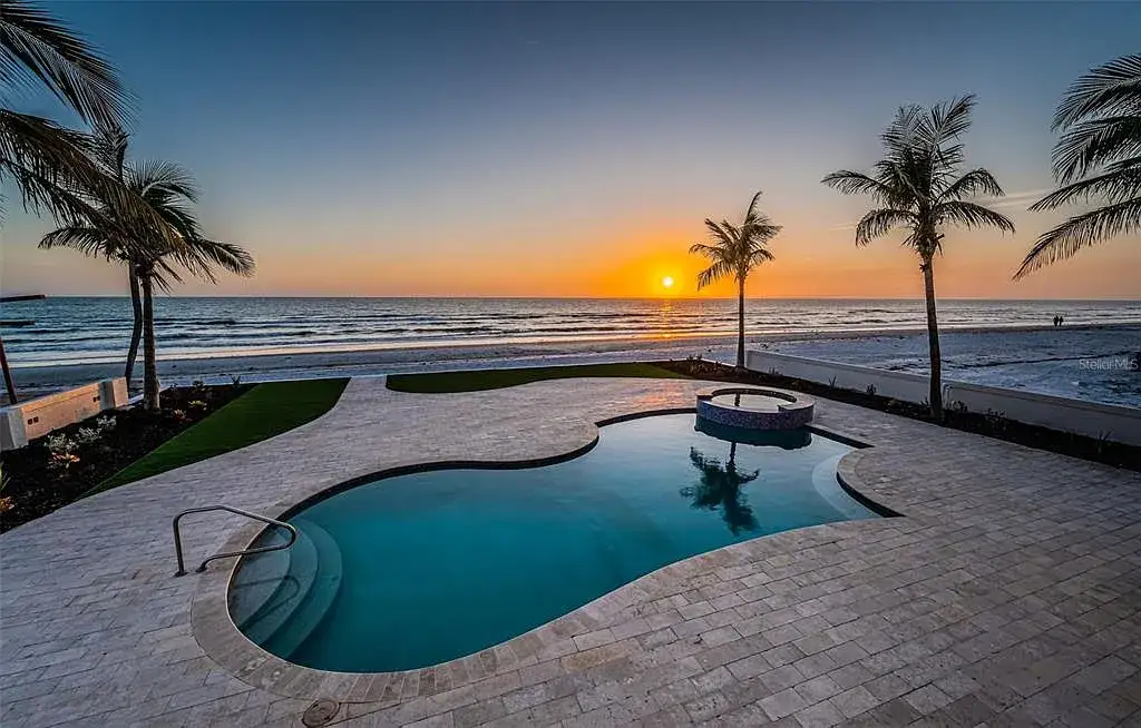 Built in 2014, this single-family residence stands on a 0.37-acre lot with 80 feet of pristine white sand beach frontage. The home’s architectural brilliance combines Tuscan coastal elements with modern craftsmanship, ensuring every detail is both aesthetically pleasing and functionally superior. With $1,532 per square foot, this estate is a testament to luxury living in Redington Beach real estate.