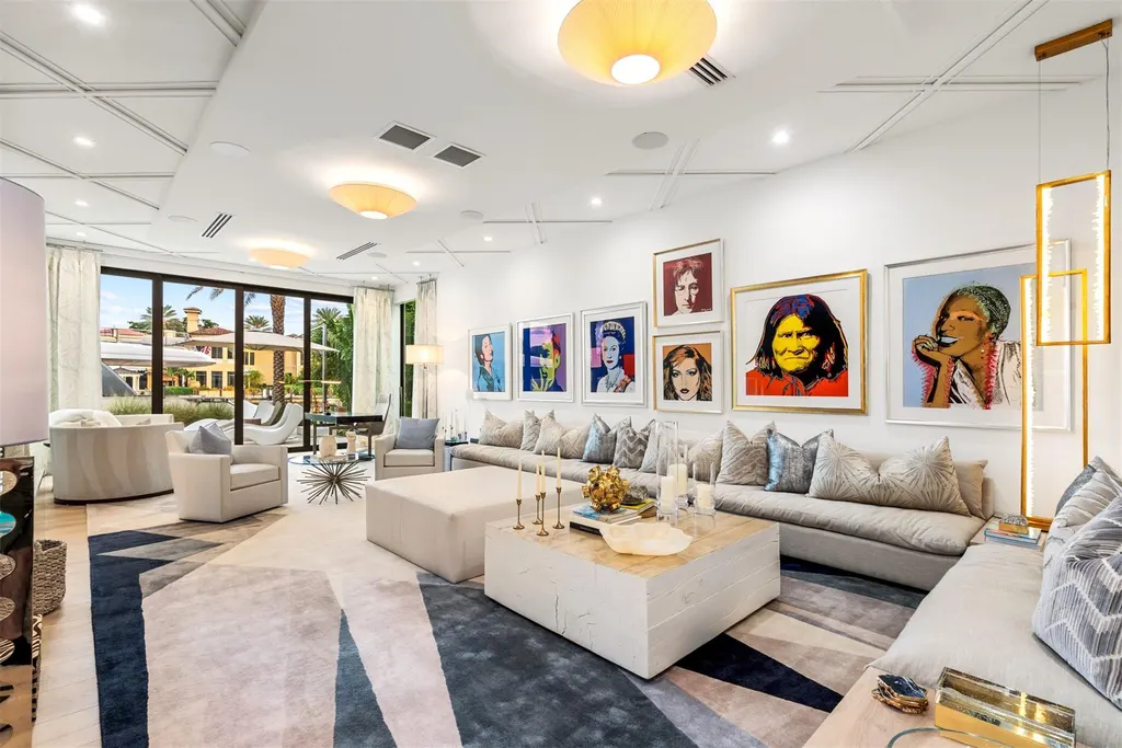 A panoramic view of 70 Isla Bahia Dr, a $23 million waterfront masterpiece in Fort Lauderdale luxury real estate, showcasing sleek modern architecture and expansive coastal views.