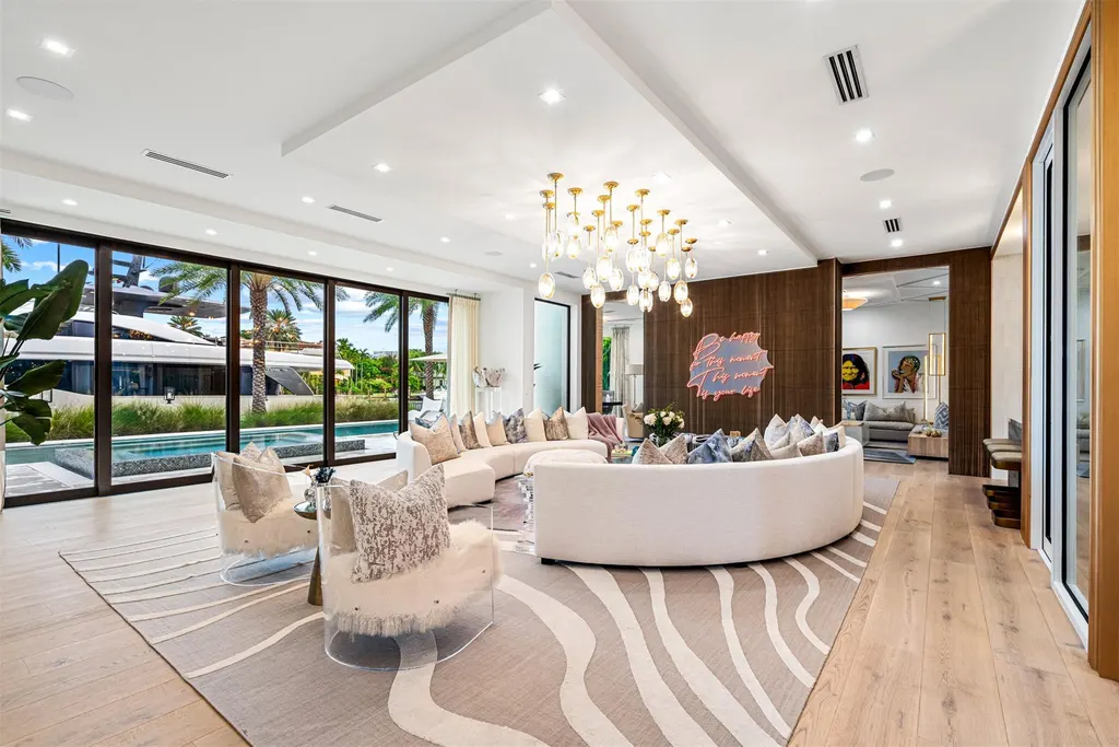 A panoramic view of 70 Isla Bahia Dr, a $23 million waterfront masterpiece in Fort Lauderdale luxury real estate, showcasing sleek modern architecture and expansive coastal views.