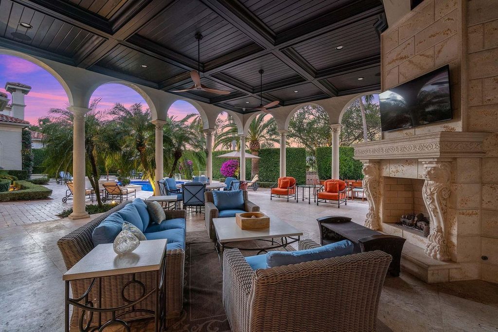 1869 Sabal Palm Drive, an ultra-luxury home in Boca Raton, offers prime golf course frontage and world-class amenities in a prestigious real estate enclave.