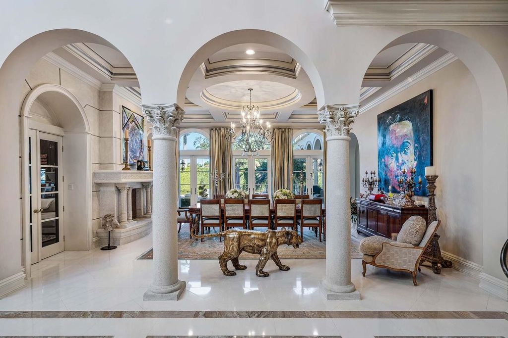 1869 Sabal Palm Drive, an ultra-luxury home in Boca Raton, offers prime golf course frontage and world-class amenities in a prestigious real estate enclave.