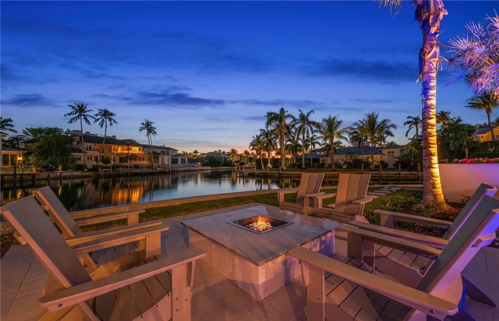 Discover the ultimate waterfront lifestyle in this exquisite Aqualane Shores estate. Set on a .37-acre corner lot with 225 feet of water frontage and coveted southwest rear exposure for breathtaking sunsets and Gulf access, this 6,603 square feet masterpiece (built in 2025) offers 5 bedrooms, 7 baths, and luxurious details throughout.