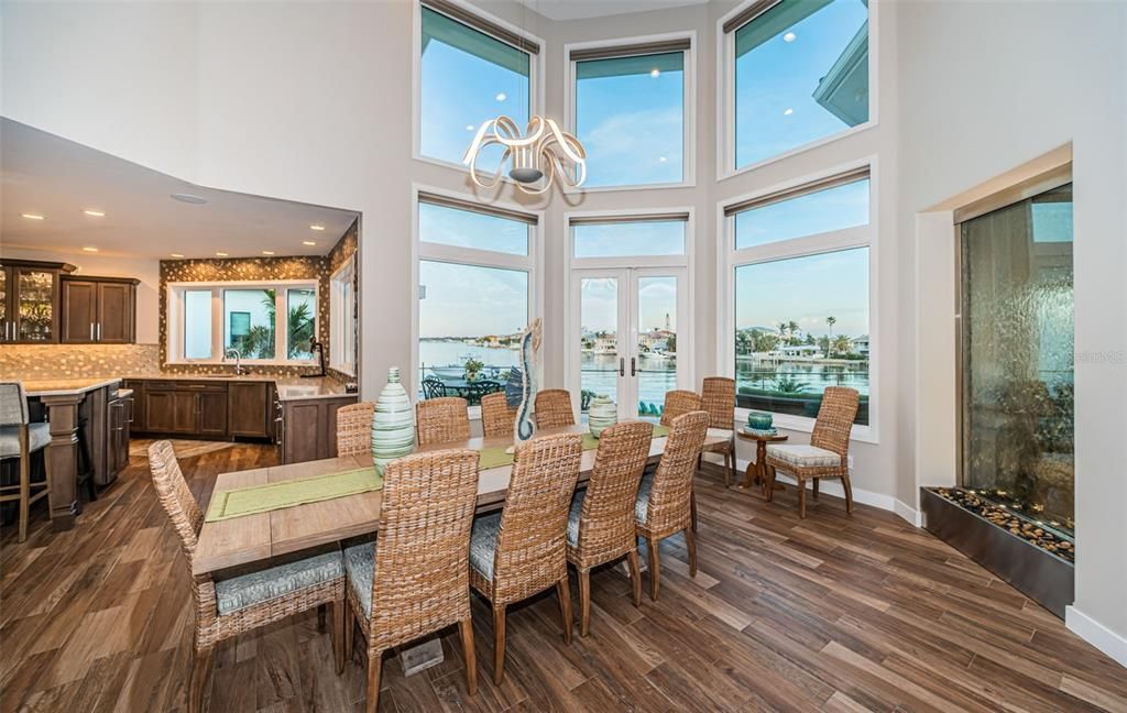 Built in 2018, this smart-home features soaring ceilings, sleek contemporary finishes, and breathtaking water views. The gourmet kitchen boasts quartz countertops, custom cabinetry, a Bosch cooking center, and a butler’s pantry.