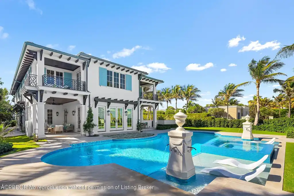 Stunning oceanfront mansion at 1742 S Ocean Blvd, Palm Beach, featuring resort-style pool, panoramic Atlantic views, and luxury interiors.