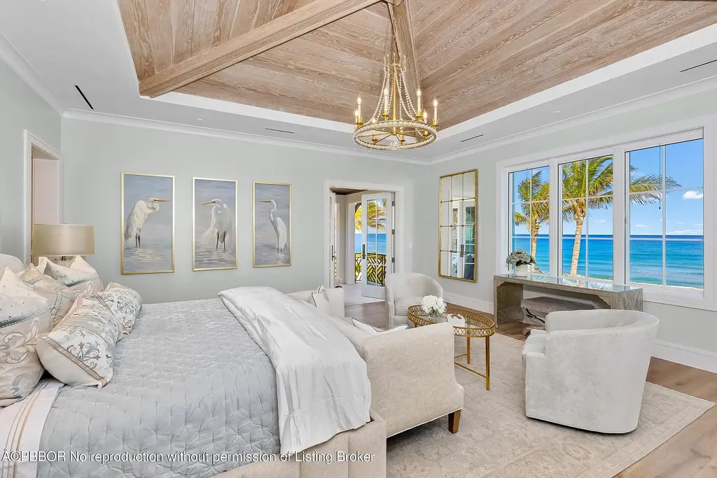 Stunning oceanfront mansion at 1742 S Ocean Blvd, Palm Beach, featuring resort-style pool, panoramic Atlantic views, and luxury interiors.