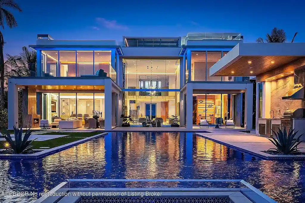 3030 Washington Rd, a $30.9M waterfront luxury home in West Palm Beach, featuring a saltwater pool, glass elevator, rooftop lounge, and breathtaking Intracoastal views.