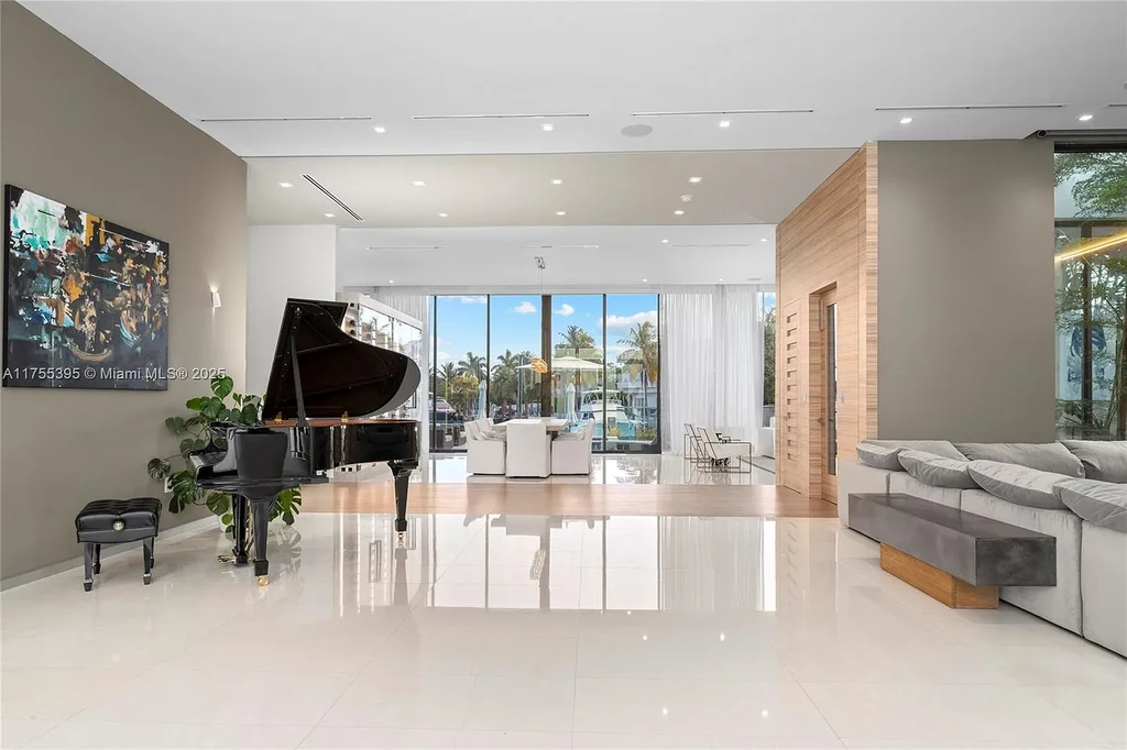 Elegant six-bedroom estate in Eastern Shores, North Miami Beach, with breathtaking water views and premium amenities.