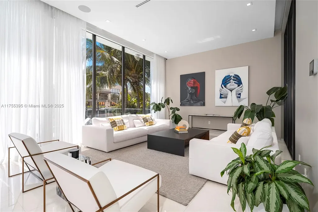 Elegant six-bedroom estate in Eastern Shores, North Miami Beach, with breathtaking water views and premium amenities.