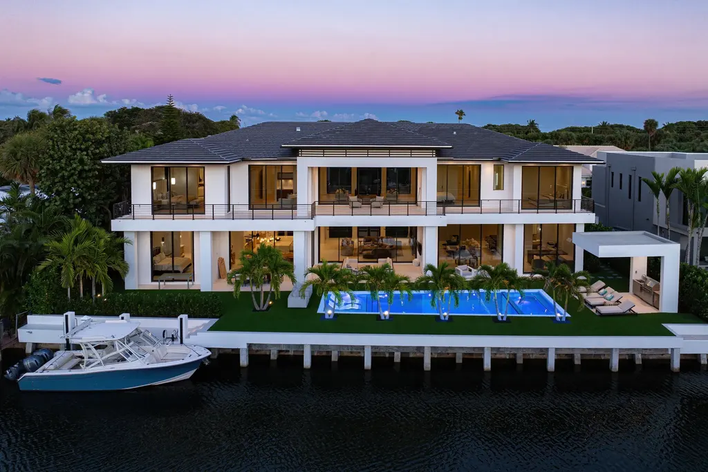 989 Marble Way, a $15.5M luxury waterfront estate in Boca Raton, featuring British West Indies-inspired architecture, Intracoastal access, and resort-style amenities.