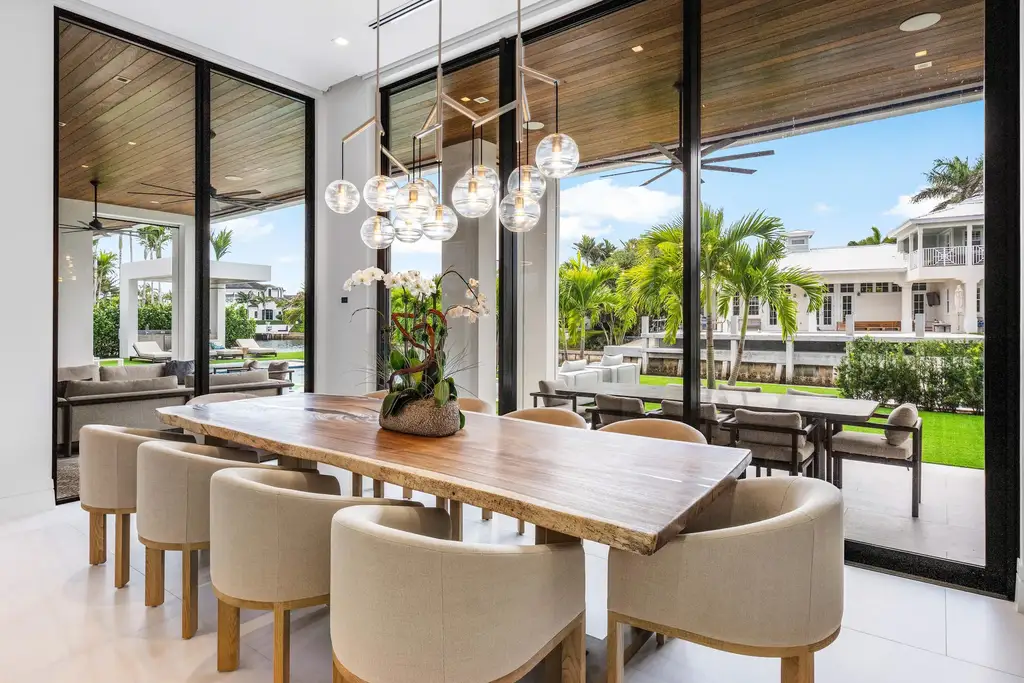 989 Marble Way, a $15.5M luxury waterfront estate in Boca Raton, featuring British West Indies-inspired architecture, Intracoastal access, and resort-style amenities.