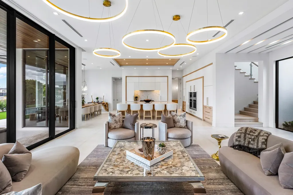 989 Marble Way, a $15.5M luxury waterfront estate in Boca Raton, featuring British West Indies-inspired architecture, Intracoastal access, and resort-style amenities.