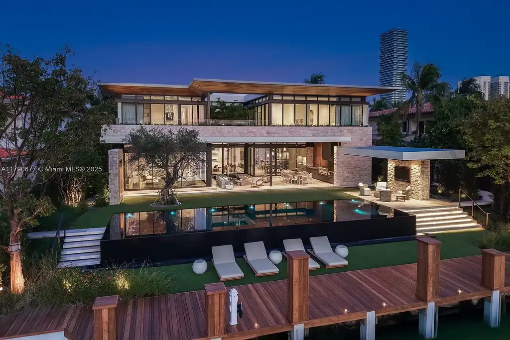 194 S Island Dr Golden Beach FL – Modern waterfront estate with Iroko wood and hand-placed stone facade, listed for $35 million