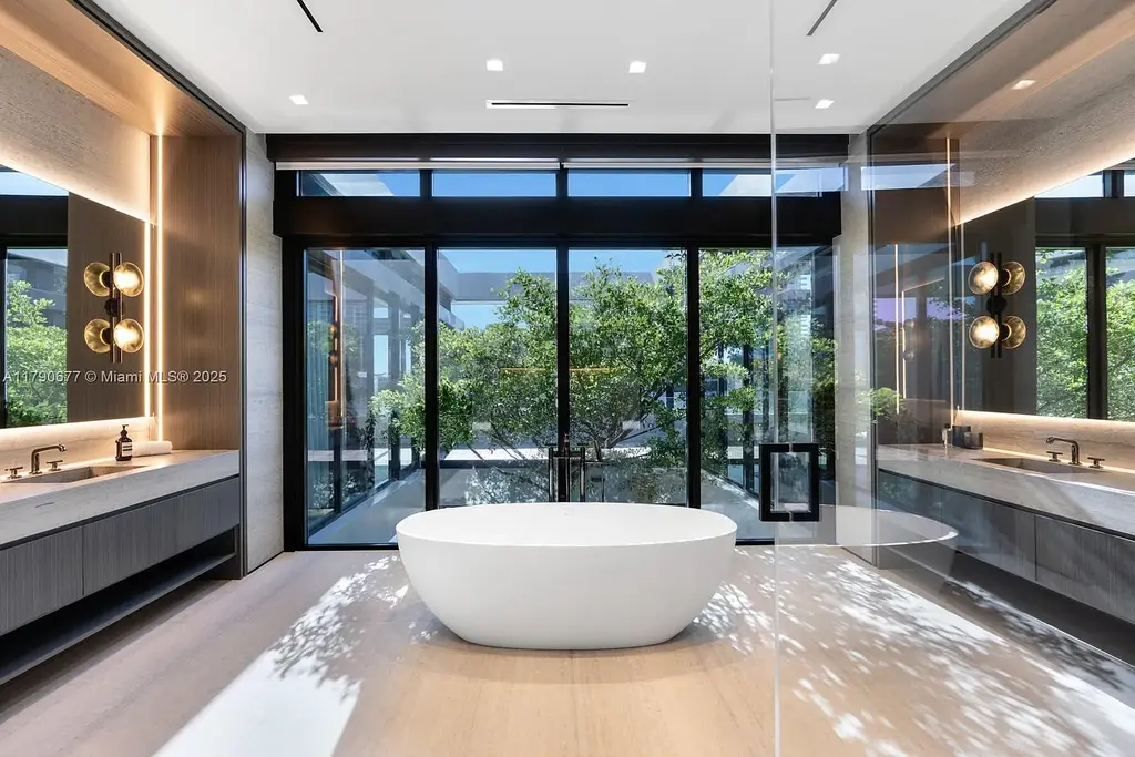 194 S Island Dr Golden Beach FL – Modern waterfront estate with Iroko wood and hand-placed stone facade, listed for $35 million