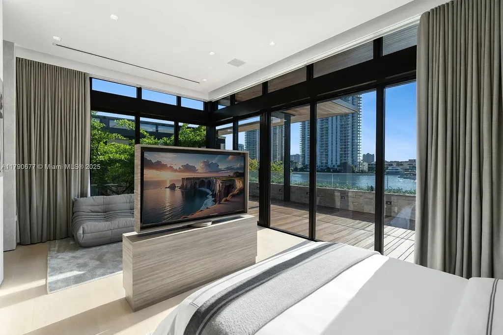 194 S Island Dr Golden Beach FL – Modern waterfront estate with Iroko wood and hand-placed stone facade, listed for $35 million