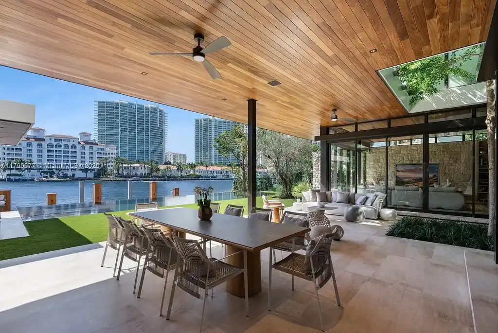 194 S Island Dr Golden Beach FL – Modern waterfront estate with Iroko wood and hand-placed stone facade, listed for $35 million