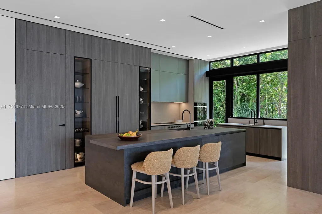 194 S Island Dr Golden Beach FL – Modern waterfront estate with Iroko wood and hand-placed stone facade, listed for $35 million