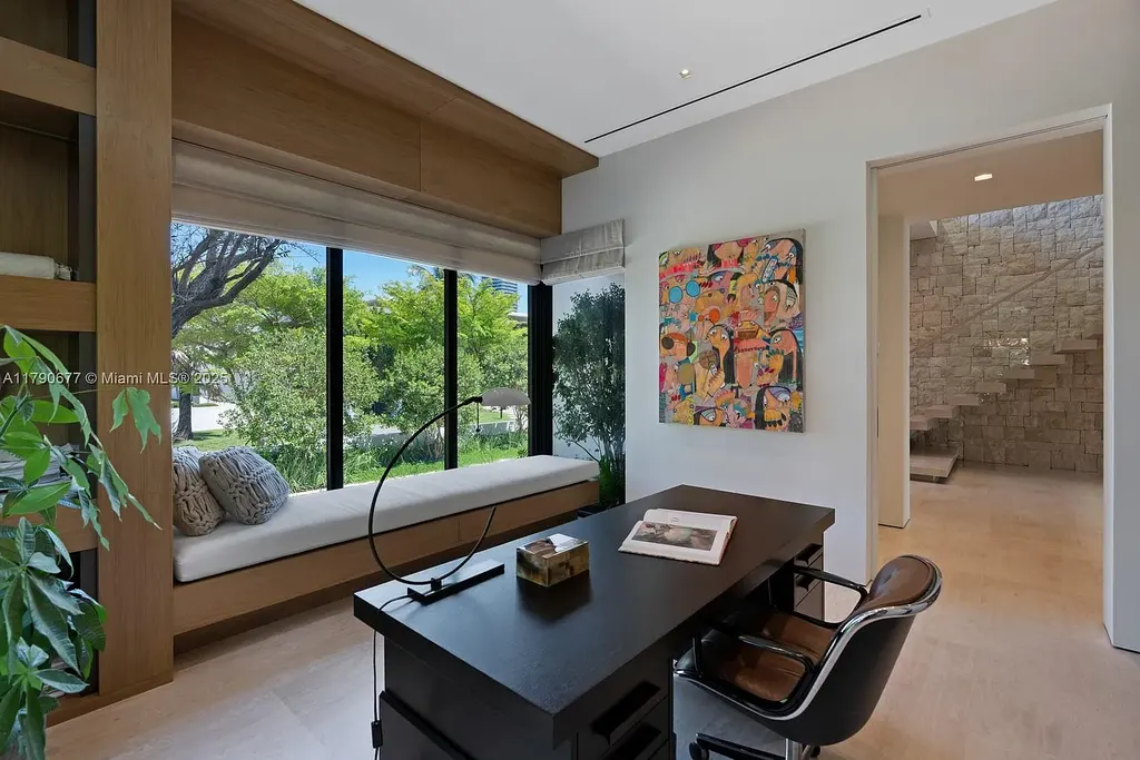 194 S Island Dr Golden Beach FL – Modern waterfront estate with Iroko wood and hand-placed stone facade, listed for $35 million