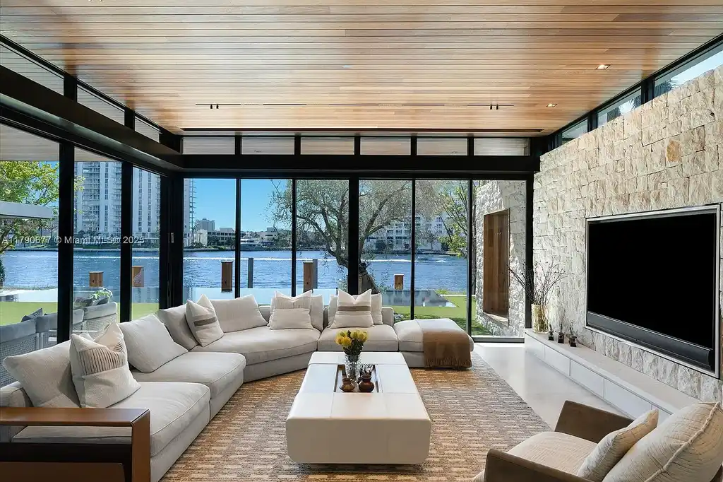 194 S Island Dr Golden Beach FL – Modern waterfront estate with Iroko wood and hand-placed stone facade, listed for $35 million