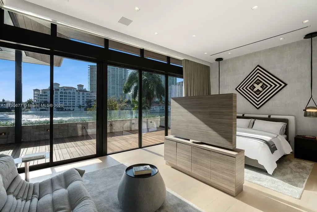 194 S Island Dr Golden Beach FL – Modern waterfront estate with Iroko wood and hand-placed stone facade, listed for $35 million