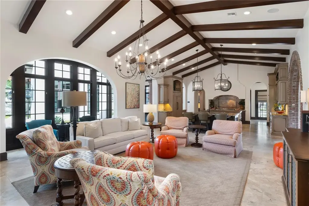 Front view of 10138 Enchanted Oak Dr showcasing Mediterranean architecture and lush landscaping in Orlando Real Estate.
