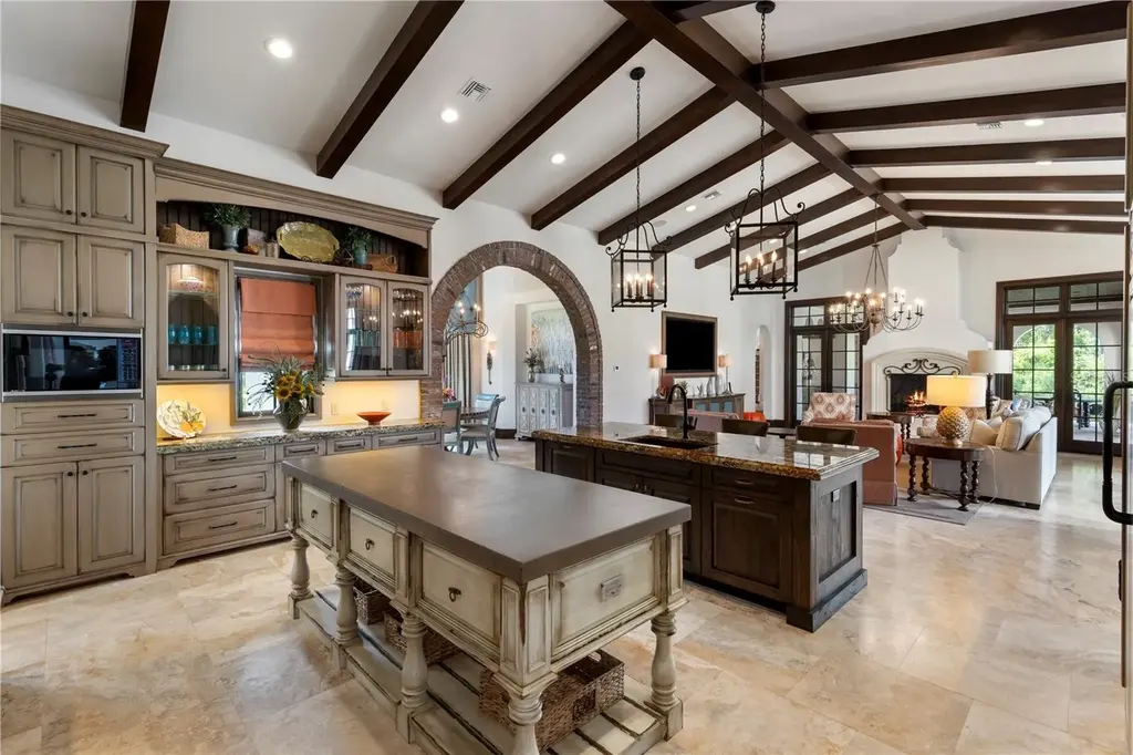 Front view of 10138 Enchanted Oak Dr showcasing Mediterranean architecture and lush landscaping in Orlando Real Estate.