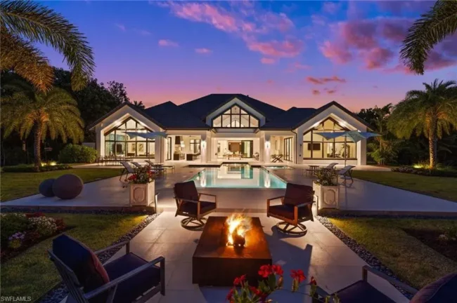 Contemporary Pine Ridge Masterpiece with Smart Tech, and Wine Room Lists for $10 Million in Naples