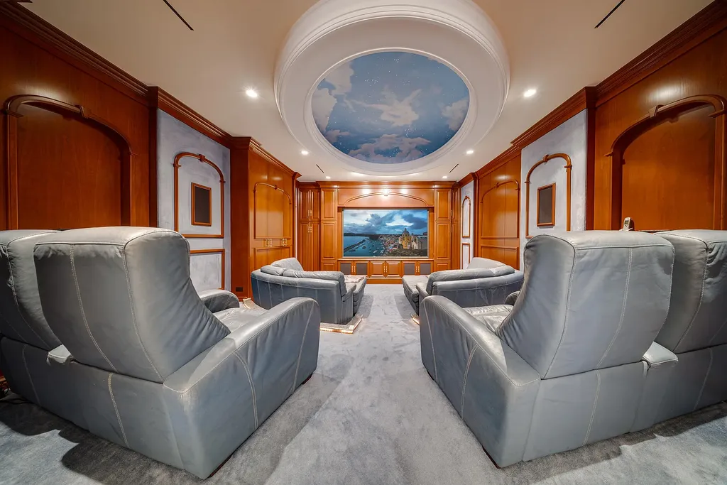 Italian-inspired luxury mansion at 1280 S Ocean Boulevard in Manalapan with waterfront frontage and lush landscaping