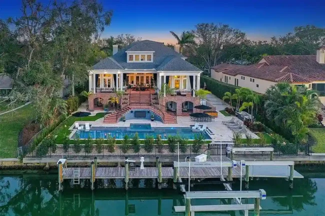 Waterfront Grandeur in Sarasota: $7.9 Million Georgian Estate With Dock, and Resort Amenities