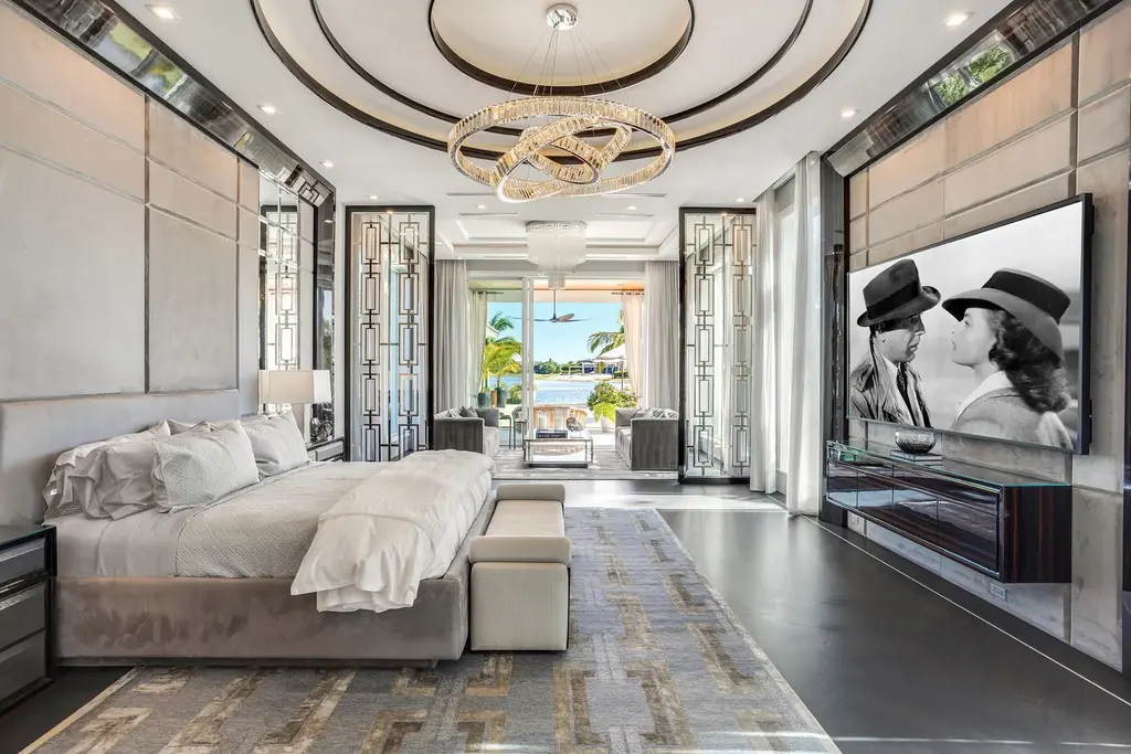 16101 Quiet Vista Circle – Ultra-luxury home in Delray Beach with lake views, saltwater pool, Har-Tru tennis court and double-island kitchen