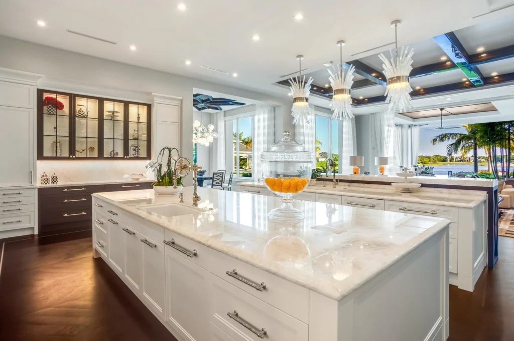 16101 Quiet Vista Circle – Ultra-luxury home in Delray Beach with lake views, saltwater pool, Har-Tru tennis court and double-island kitchen
