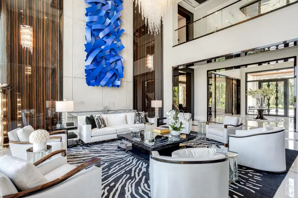 16101 Quiet Vista Circle – Ultra-luxury home in Delray Beach with lake views, saltwater pool, Har-Tru tennis court and double-island kitchen