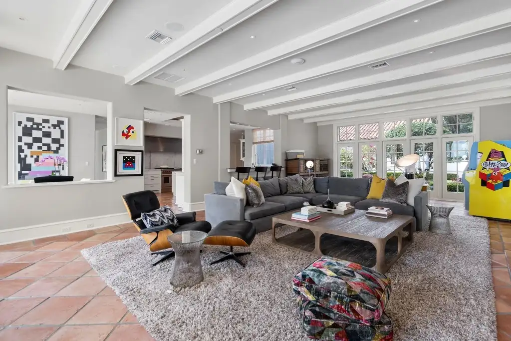 Luxurious Mediterranean estate at 1640 E Adams Dr in Maitland, featuring a grand motor court and lush landscaping