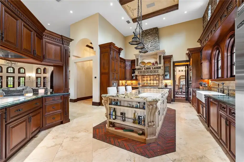 Elegant living room with high ceilings and Crestron smart home system at 17201 SW 248th St in Homestead, FL