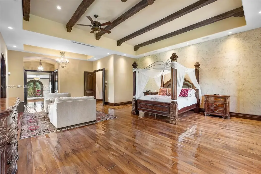 Elegant living room with high ceilings and Crestron smart home system at 17201 SW 248th St in Homestead, FL