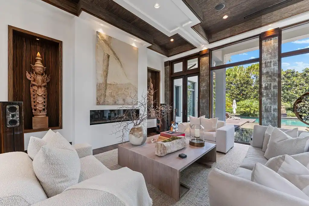 Front exterior view of the luxury $24.5M estate at 232 Bears Club Drive in Jupiter, Florida, showcasing Mediterranean architecture, manicured landscaping, and golf course frontage.