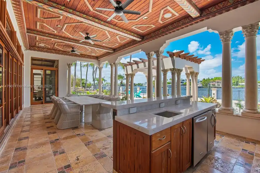 Luxury waterfront estate at 2509 Aqua Vista Blvd in Fort Lauderdale featuring a Mediterranean-style exterior, lagoon pool, and 200 ft of Intracoastal frontage.