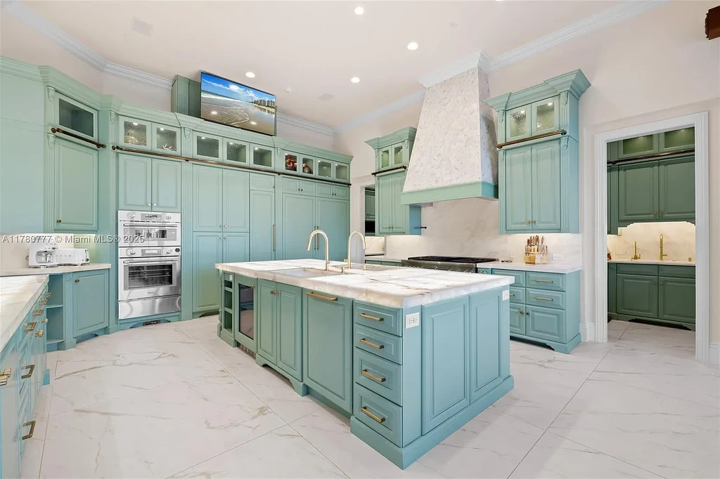 Luxury waterfront estate at 2509 Aqua Vista Blvd in Fort Lauderdale featuring a Mediterranean-style exterior, lagoon pool, and 200 ft of Intracoastal frontage.